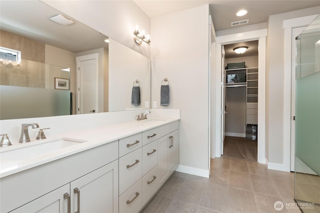 6346 Marymere Rd SW, Port Orchard, WA 98367 - full bathroom featuring double vanity, tile patterned flooring, and a spacious closet