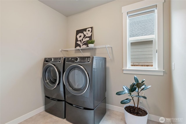 6346 Marymere Rd SW, Port Orchard, WA 98367 - laundry area with washing machine and clothes dryer and baseboards