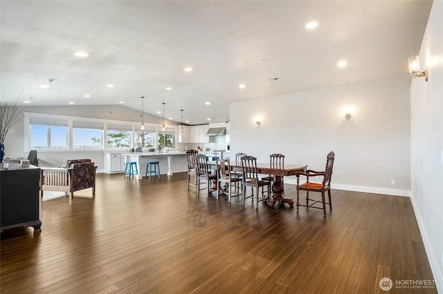 6 Pelican Pl SE, Moses Lake, WA 98837 - dining area featuring baseboards, lofted ceiling, dark wood-style floors, and recessed lighting