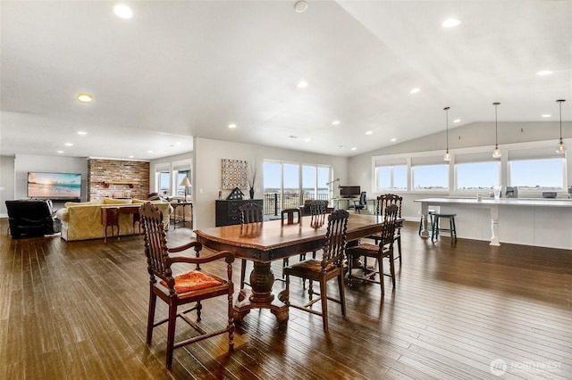 6 Pelican Pl SE, Moses Lake, WA 98837 - dining area with dark wood-style flooring, lofted ceiling, and recessed lighting
