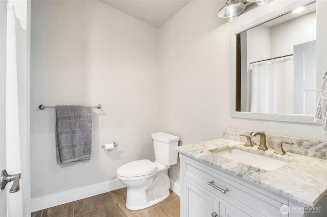 6 Pelican Pl SE, Moses Lake, WA 98837 - full bathroom with toilet, vanity, tile patterned flooring, and baseboards