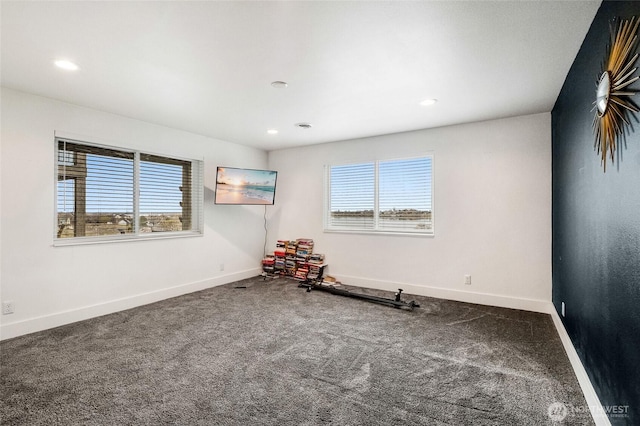 6 Pelican Pl SE, Moses Lake, WA 98837 - spare room with baseboards, carpet flooring, and a wealth of natural light