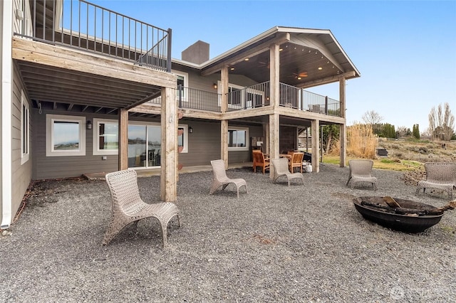 6 Pelican Pl SE, Moses Lake, WA 98837 - rear view of house featuring a fire pit and a patio area