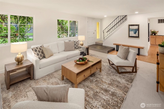 15126 NE 67th Pl, Redmond, WA 98052 - living area with recessed lighting, baseboards, visible vents, and stairway