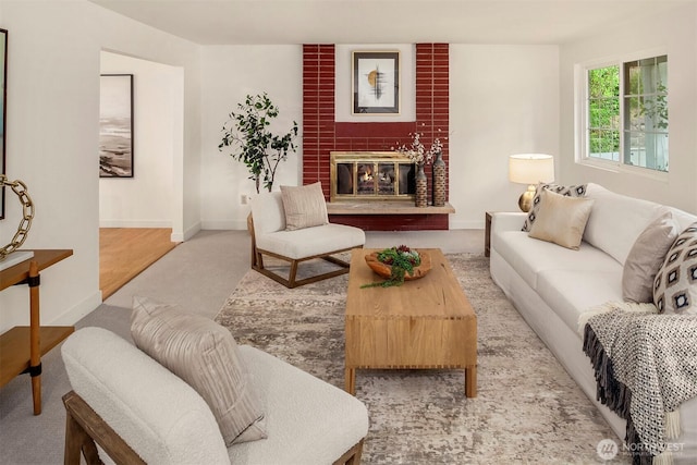 15126 NE 67th Pl, Redmond, WA 98052 - living room featuring baseboards, carpet, and a fireplace