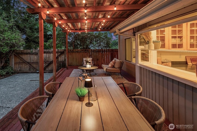15126 NE 67th Pl, Redmond, WA 98052 - wooden terrace featuring a pergola, fence, and outdoor dining area