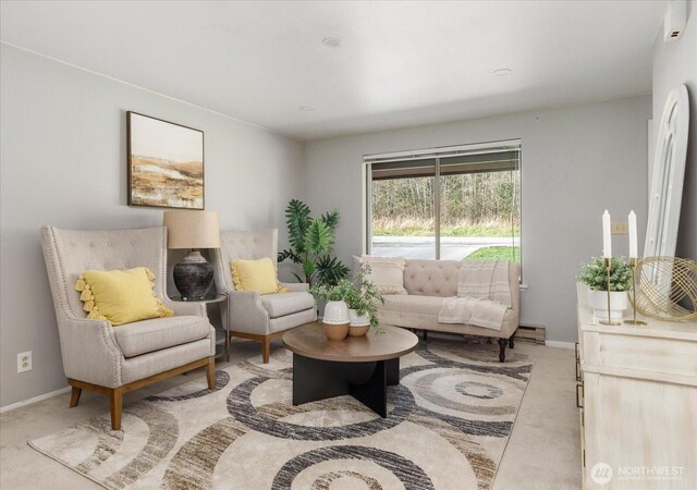 carpeted living room featuring baseboards and baseboard heating