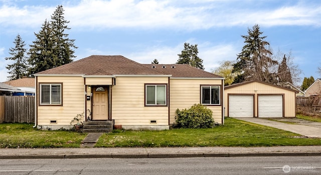 861 S 72nd St, Tacoma, WA 98408 - view of front of home featuring fence, an outdoor structure, concrete driveway, and a front yard