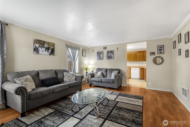 861 S 72nd St, Tacoma, WA 98408 - living area with light wood-style flooring, crown molding, baseboards, and visible vents