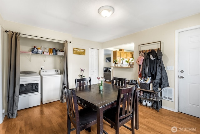 861 S 72nd St, Tacoma, WA 98408 - dining space featuring light wood-style floors, washer and dryer, and visible vents