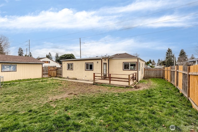 861 S 72nd St, Tacoma, WA 98408 - back of property featuring a fenced backyard and a yard