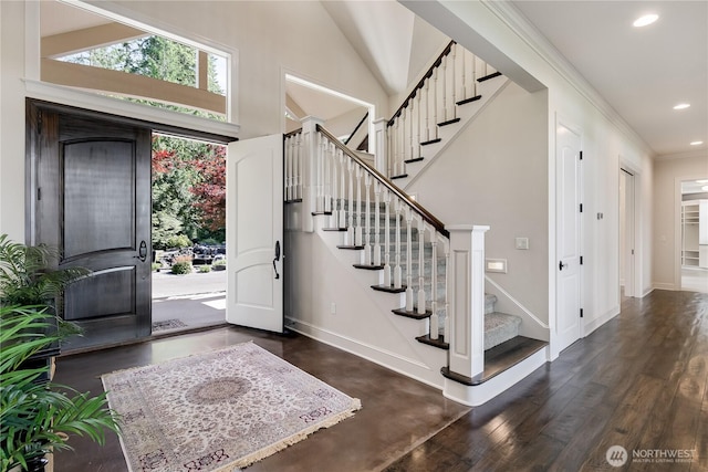 1220 Madrona Beach Rd NW, Olympia, WA 98502 - entryway featuring ornamental molding, recessed lighting, wood finished floors, stairs, and baseboards