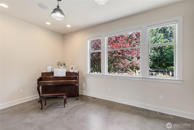 1220 Madrona Beach Rd NW, Olympia, WA 98502 - living area with recessed lighting, visible vents, baseboards, and concrete flooring