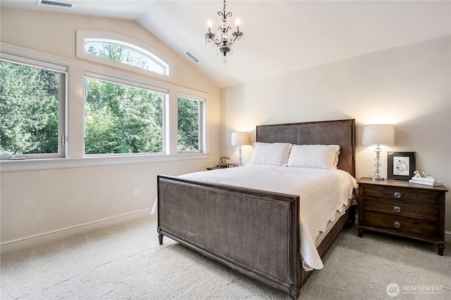 1220 Madrona Beach Rd NW, Olympia, WA 98502 - carpeted bedroom featuring baseboards, visible vents, vaulted ceiling, and an inviting chandelier