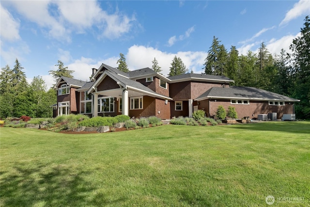 1220 Madrona Beach Rd NW, Olympia, WA 98502 - view of front of home with cooling unit and a front yard