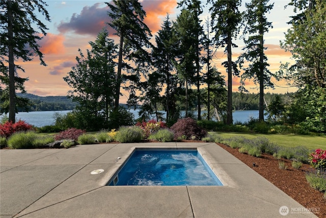 1220 Madrona Beach Rd NW, Olympia, WA 98502 - view of pool featuring a water view and a lawn