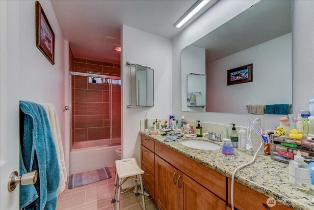 4509 Eastern Ave N Unit 1-3, Seattle, WA 98103 - full bathroom with tile patterned floors, vanity, and bath / shower combo with glass door