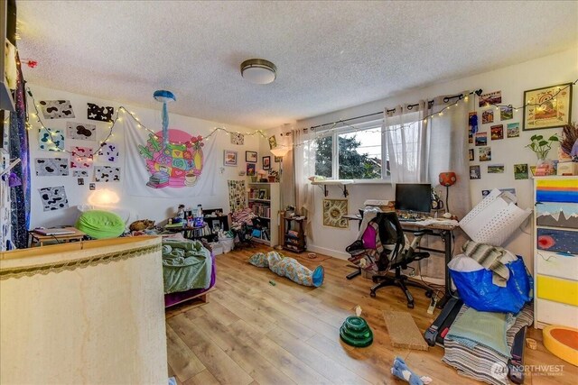 4509 Eastern Ave N Unit 1-3, Seattle, WA 98103 - interior space featuring wood finished floors and a textured ceiling
