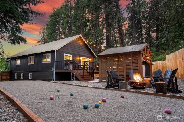 417 W 2nd St, Cle Elum, WA 98922 - view of front of house with a fire pit and fence