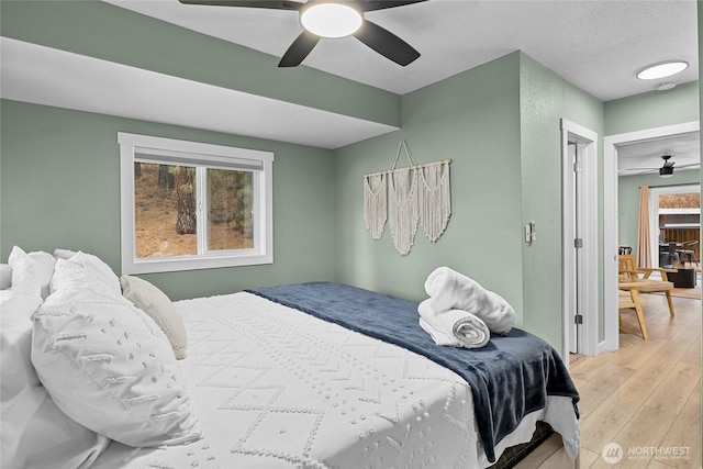 417 W 2nd St, Cle Elum, WA 98922 - bedroom with ceiling fan and light wood-style floors