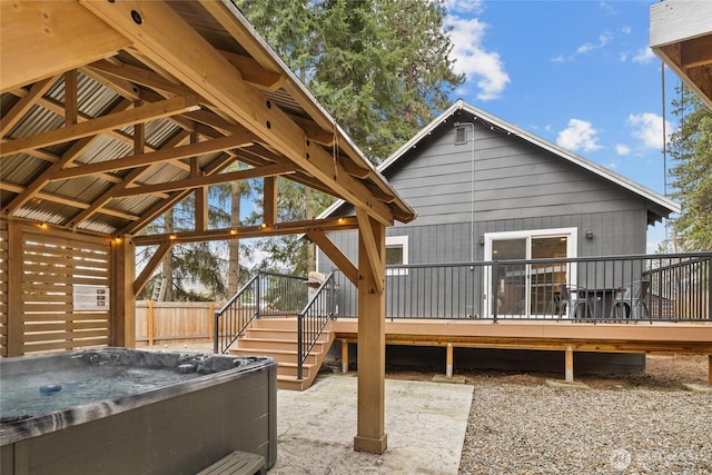 417 W 2nd St, Cle Elum, WA 98922 - exterior space featuring fence, a deck, and a hot tub