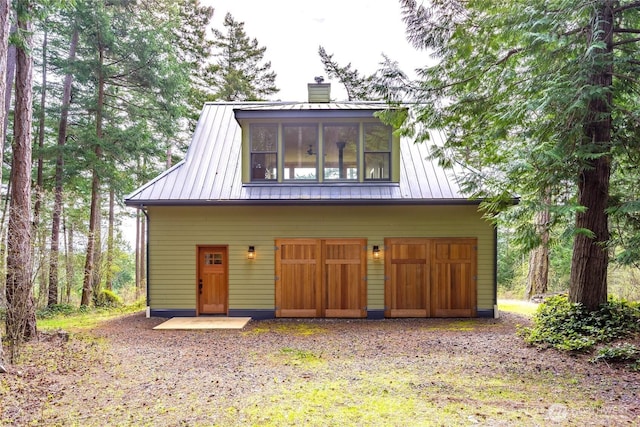 186 S Ridge Rd, Decatur Island, WA 98221 - exterior space with an attached garage