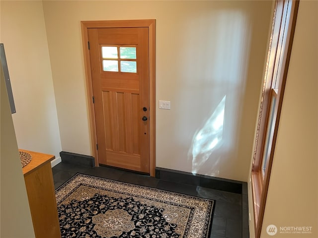 186 S Ridge Rd, Decatur Island, WA 98221 - foyer entrance featuring tile patterned floors and baseboards