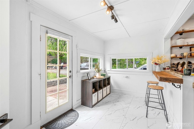 sunroom / solarium with healthy amount of natural light