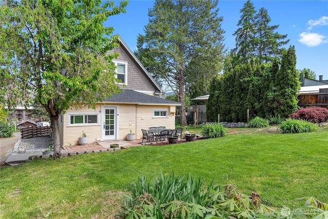 back of property featuring a patio
