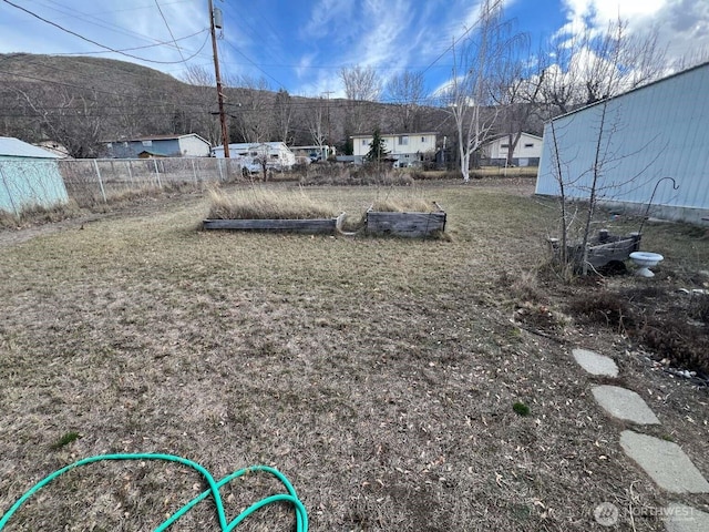 view of yard featuring fence