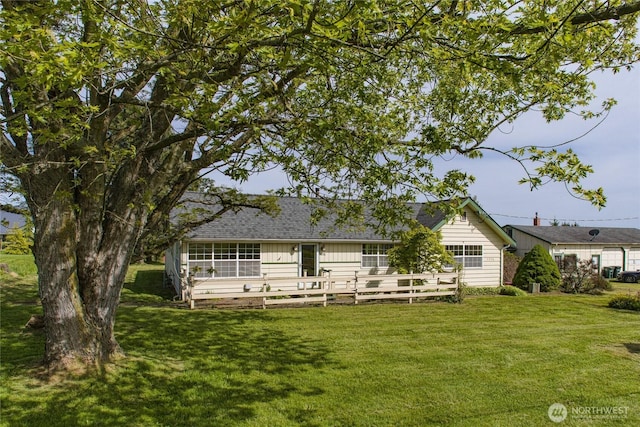 5296 Olson Rd, Ferndale, WA 98248 - rear view of house featuring a yard, roof with shingles, and board and batten siding