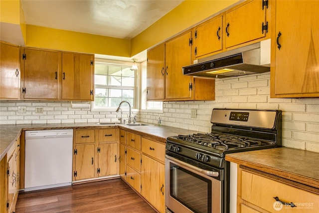 5296 Olson Rd, Ferndale, WA 98248 - kitchen featuring stainless steel gas range oven, white dishwasher, under cabinet range hood, a sink, and backsplash