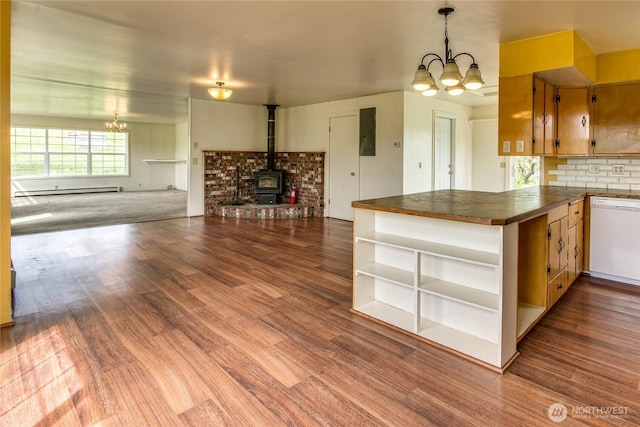 5296 Olson Rd, Ferndale, WA 98248 - kitchen with a chandelier, dark countertops, white dishwasher, and wood finished floors