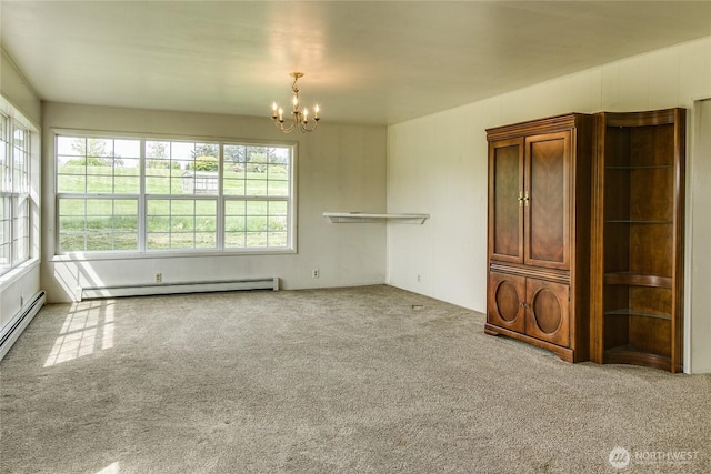 5296 Olson Rd, Ferndale, WA 98248 - carpeted empty room featuring baseboard heating and a chandelier