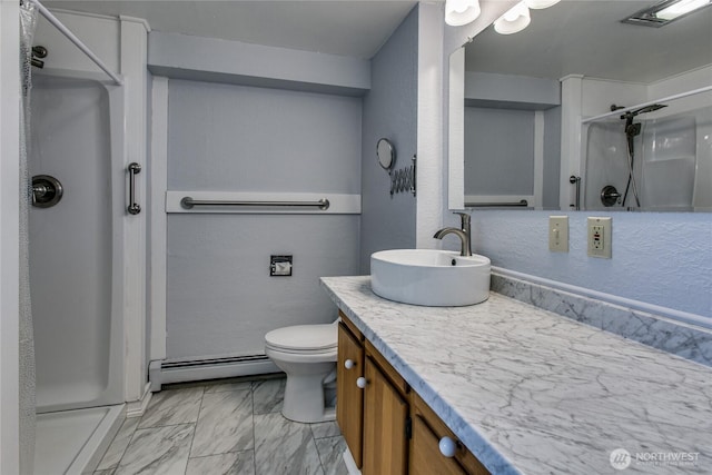 5296 Olson Rd, Ferndale, WA 98248 - full bath featuring baseboard heating, a shower stall, marble finish floors, and vanity