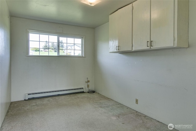 5296 Olson Rd, Ferndale, WA 98248 - spare room with baseboard heating and carpet flooring