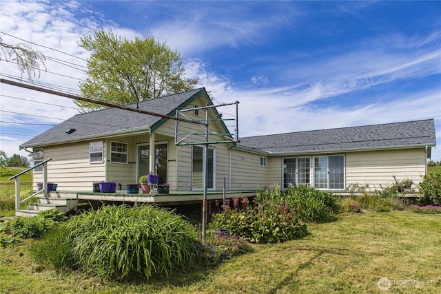 5296 Olson Rd, Ferndale, WA 98248 - back of property with a yard and a deck