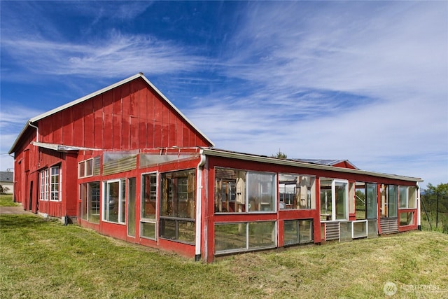 5296 Olson Rd, Ferndale, WA 98248 - rear view of property with a sunroom and a yard