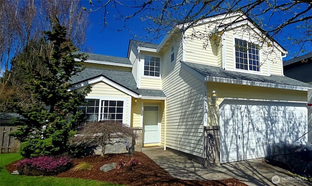 view of front of house with fence
