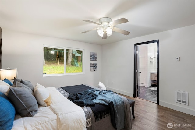 bedroom with wood finished floors, baseboards, and a ceiling fan