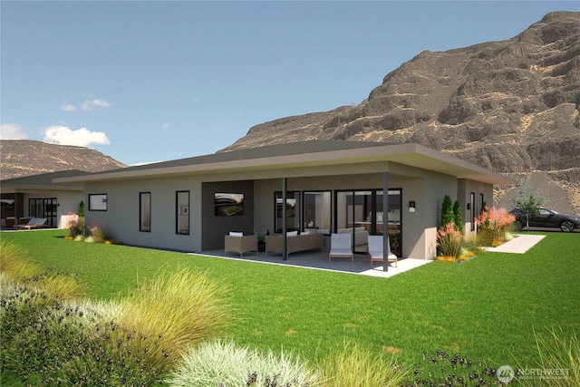 rear view of house featuring an outdoor hangout area, a patio, stucco siding, a mountain view, and a yard