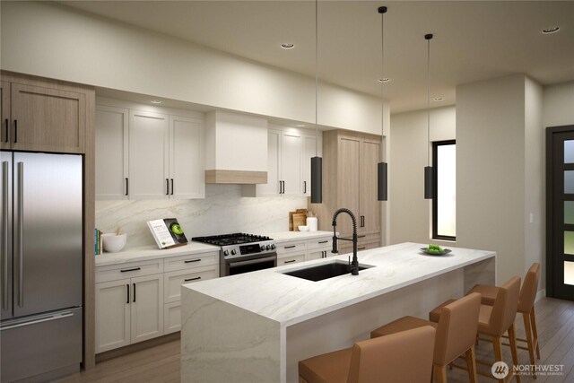 kitchen featuring a kitchen island with sink, stainless steel appliances, dark wood-type flooring, a sink, and custom range hood