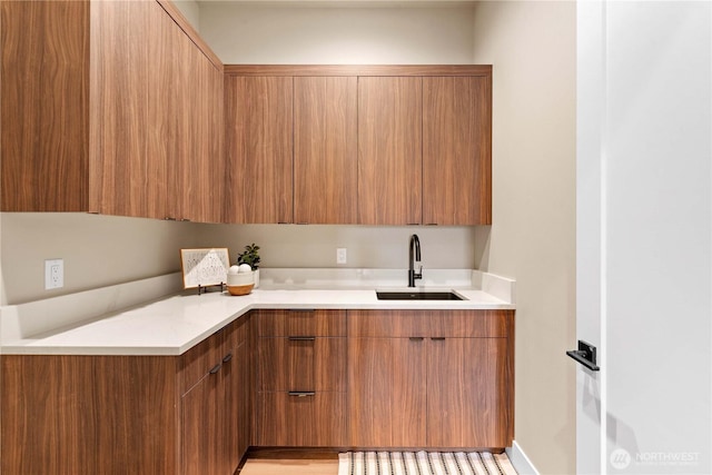 9604 Ridgeview Dr NW, Quincy, WA 98848 - kitchen with a sink, modern cabinets, and brown cabinets