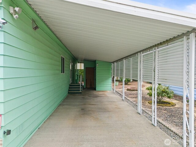 11436 SE 208th St Unit 33, Kent, WA 98031 - view of patio with a carport