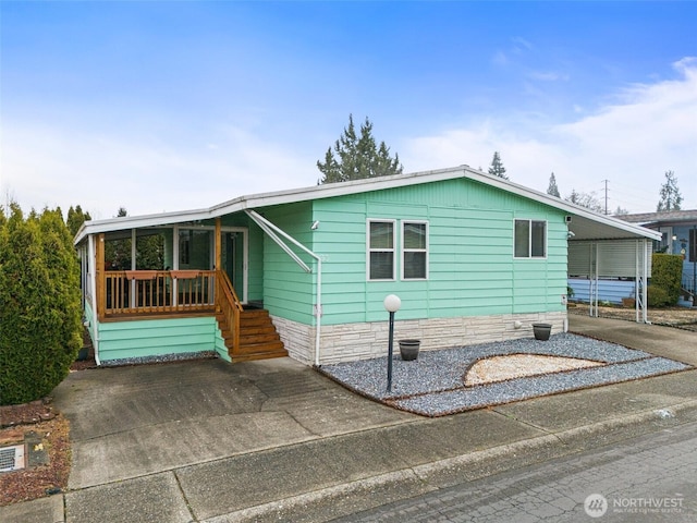 11436 SE 208th St Unit 33, Kent, WA 98031 - manufactured / mobile home with an attached carport