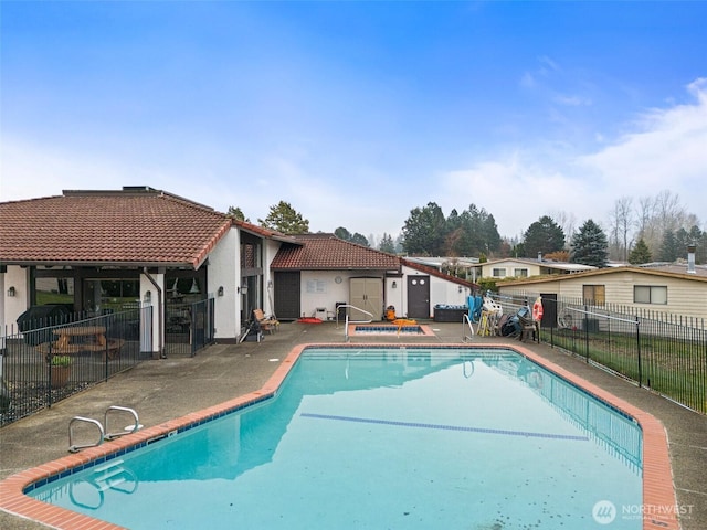 11436 SE 208th St Unit 33, Kent, WA 98031 - view of swimming pool featuring fence, a patio, and a fenced in pool
