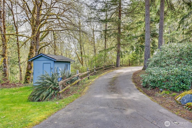view of street with a wooded view