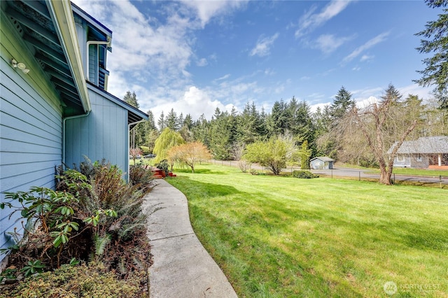 view of yard featuring fence
