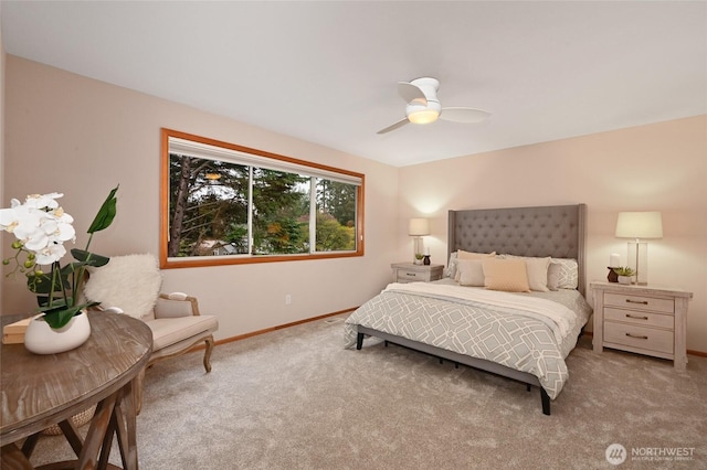 bedroom featuring carpet floors, baseboards, and a ceiling fan