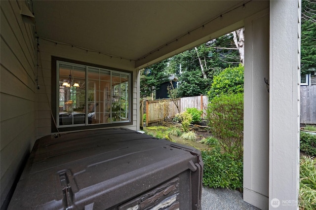 view of patio featuring fence